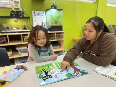 5-year-old transitional kindergarten child at Kids Adventure Learning Center doing one-on-one STEM learning with a teacher